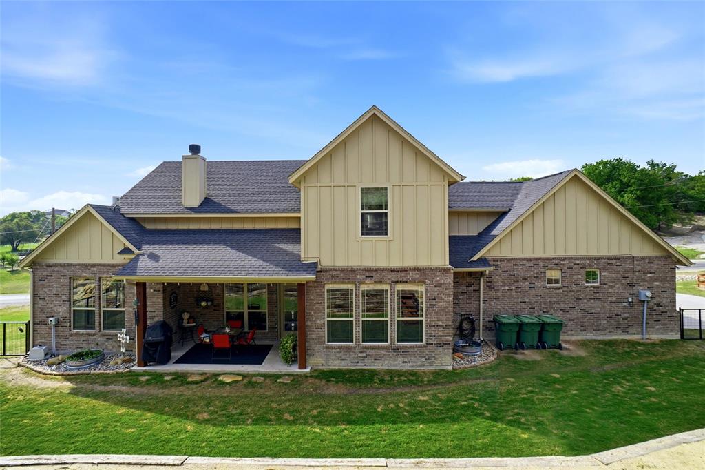 1024 Tex Lane Springtown, TX 76082 - Photo 9 of 40 a front view of a house with a yard