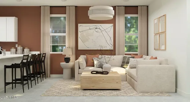 a dining room with furniture and a window