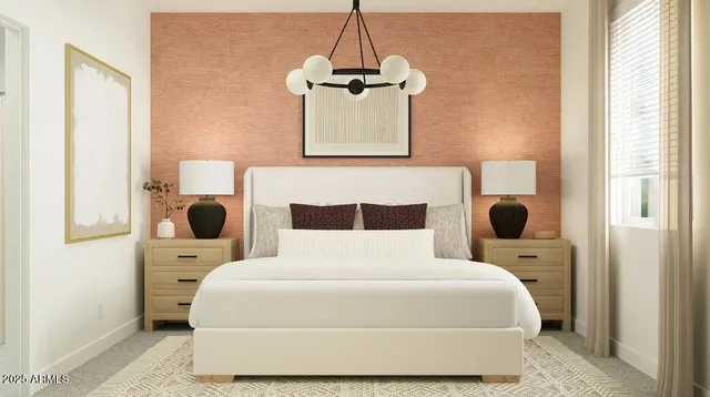 a living room with furniture a table and a painting