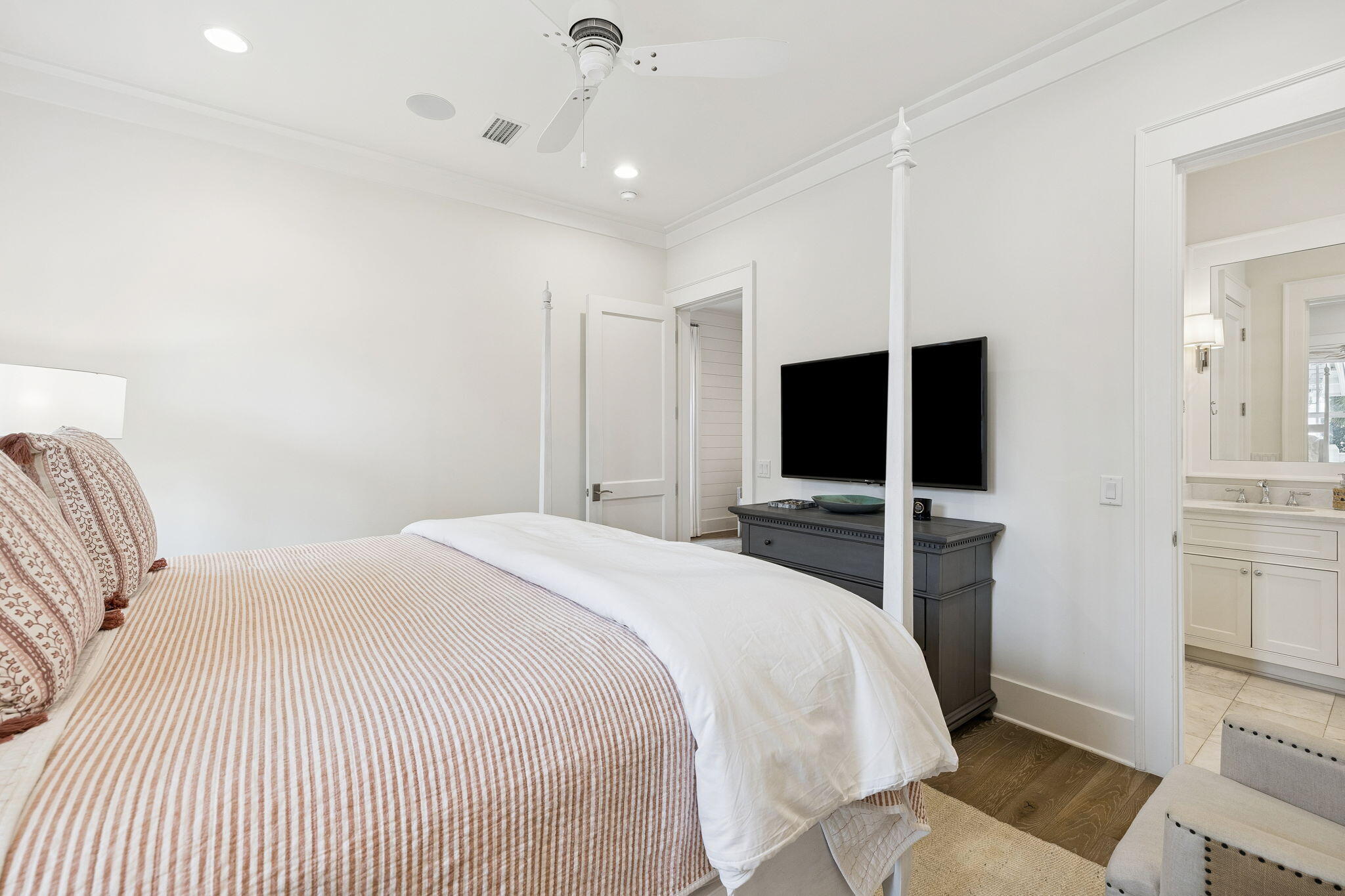 17 Compass Point Way Watersound, FL 32461 - Photo 15 of 73 a bedroom with a bed and a flat tv screen on wall