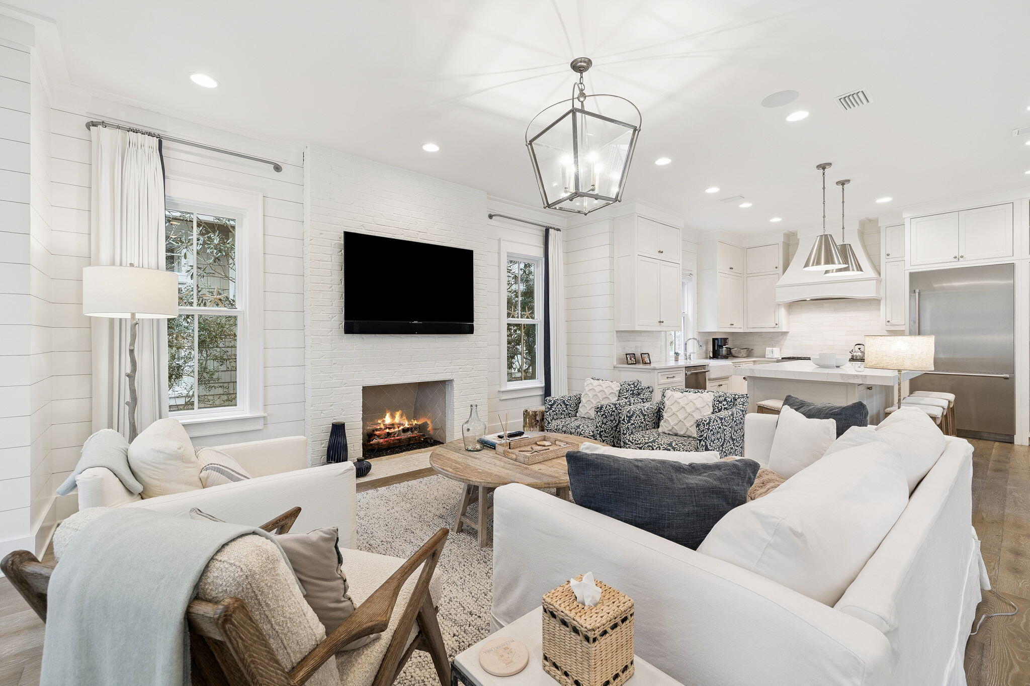 17 Compass Point Way Watersound, FL 32461 - Photo 27 of 73 a living room with furniture a fireplace and a flat screen tv