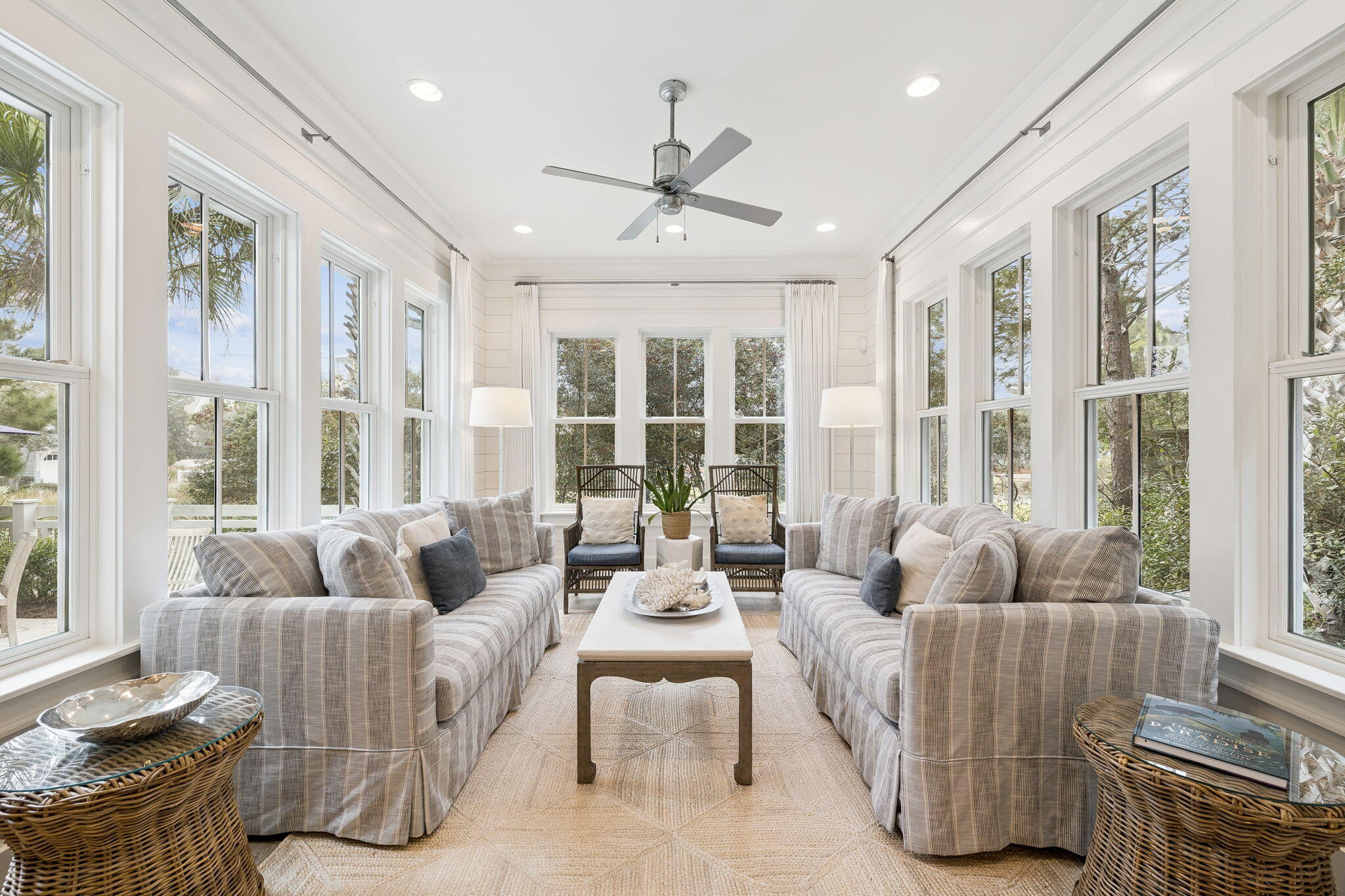 17 Compass Point Way Watersound, FL 32461 - Photo 28 of 73 a living room with furniture and large windows