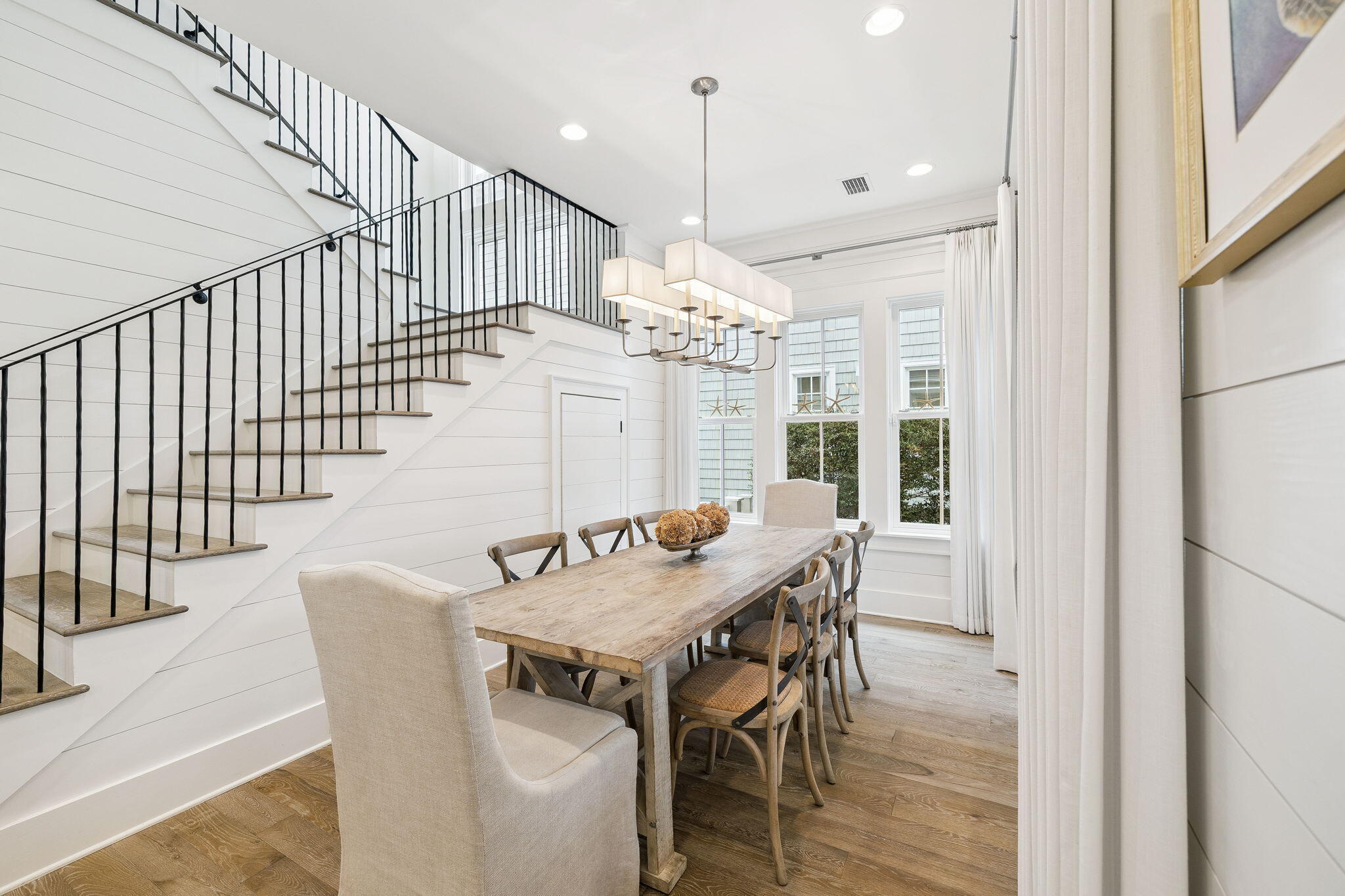 17 Compass Point Way Watersound, FL 32461 - Photo 31 of 73 a view of a dining room with furniture window and wooden floor
