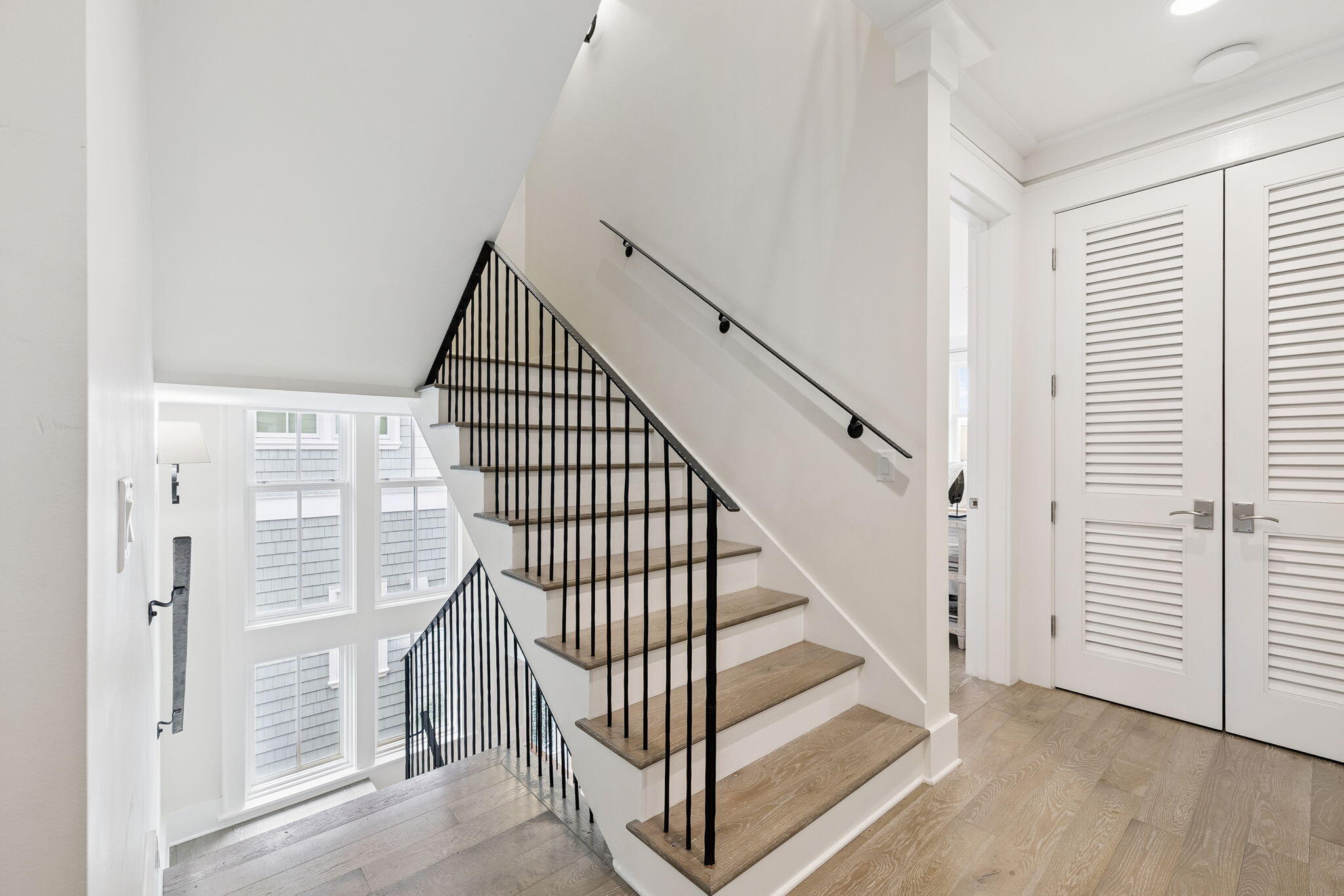 17 Compass Point Way Watersound, FL 32461 - Photo 34 of 73 a view of entryway with wooden floor and stairs