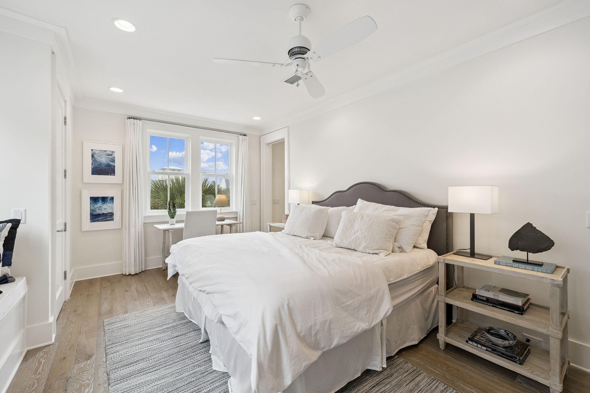 17 Compass Point Way Watersound, FL 32461 - Photo 35 of 73 a bedroom with a bed and wooden floor