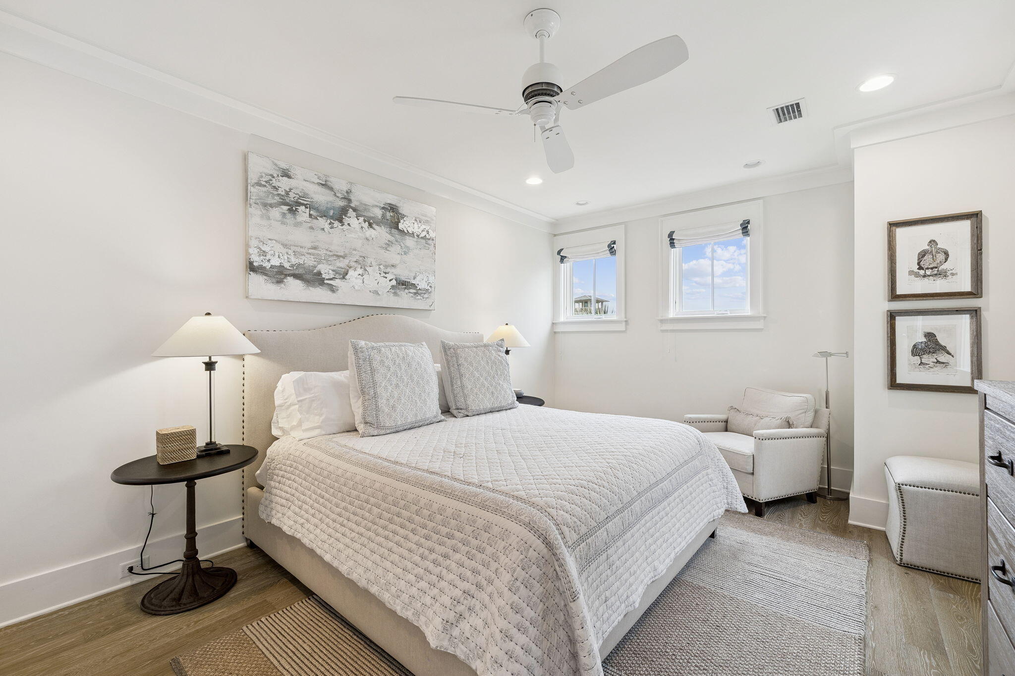 17 Compass Point Way Watersound, FL 32461 - Photo 40 of 73 a bedroom with a bed and a table