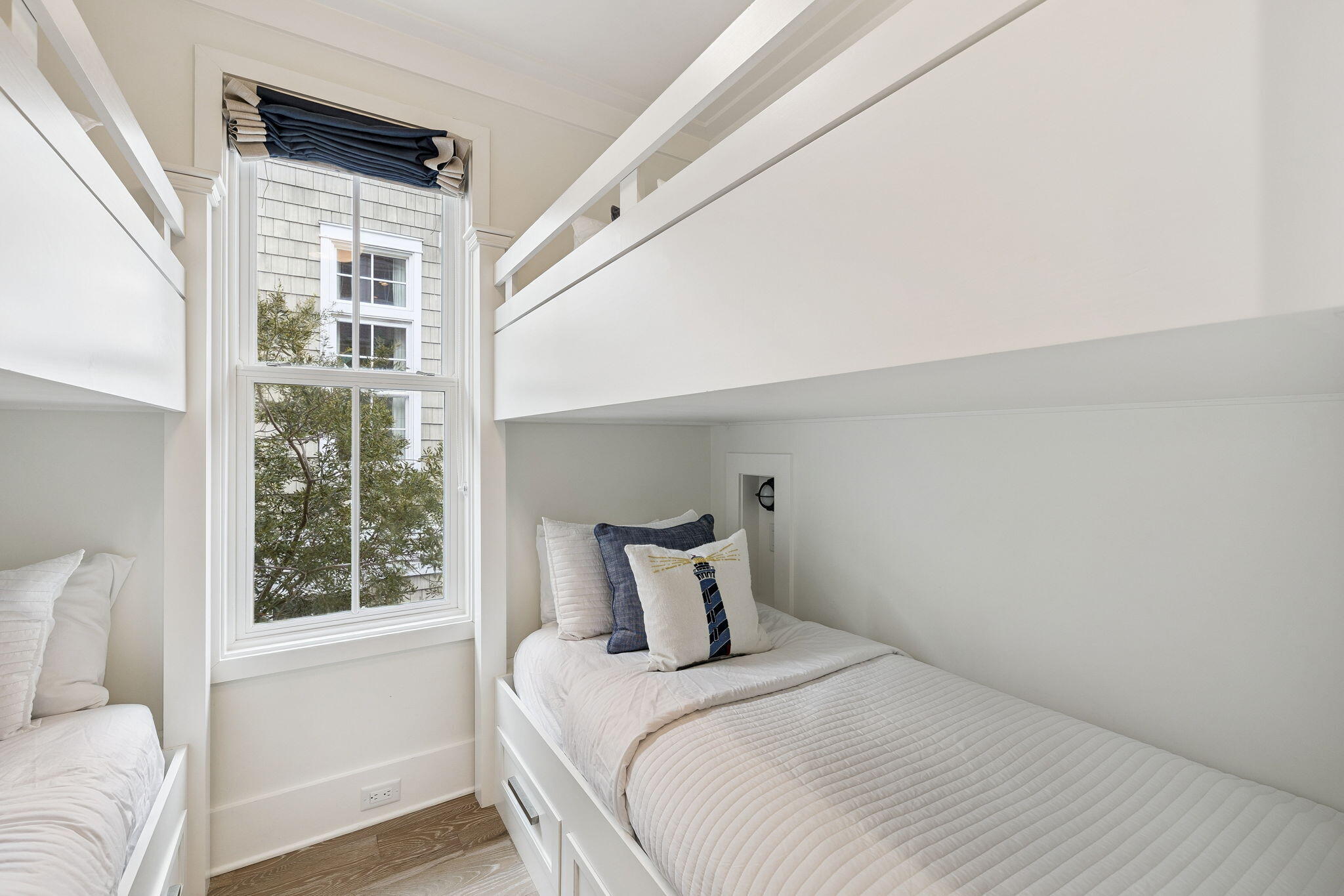 17 Compass Point Way Watersound, FL 32461 - Photo 43 of 73 a bedroom with a bed and wooden floor