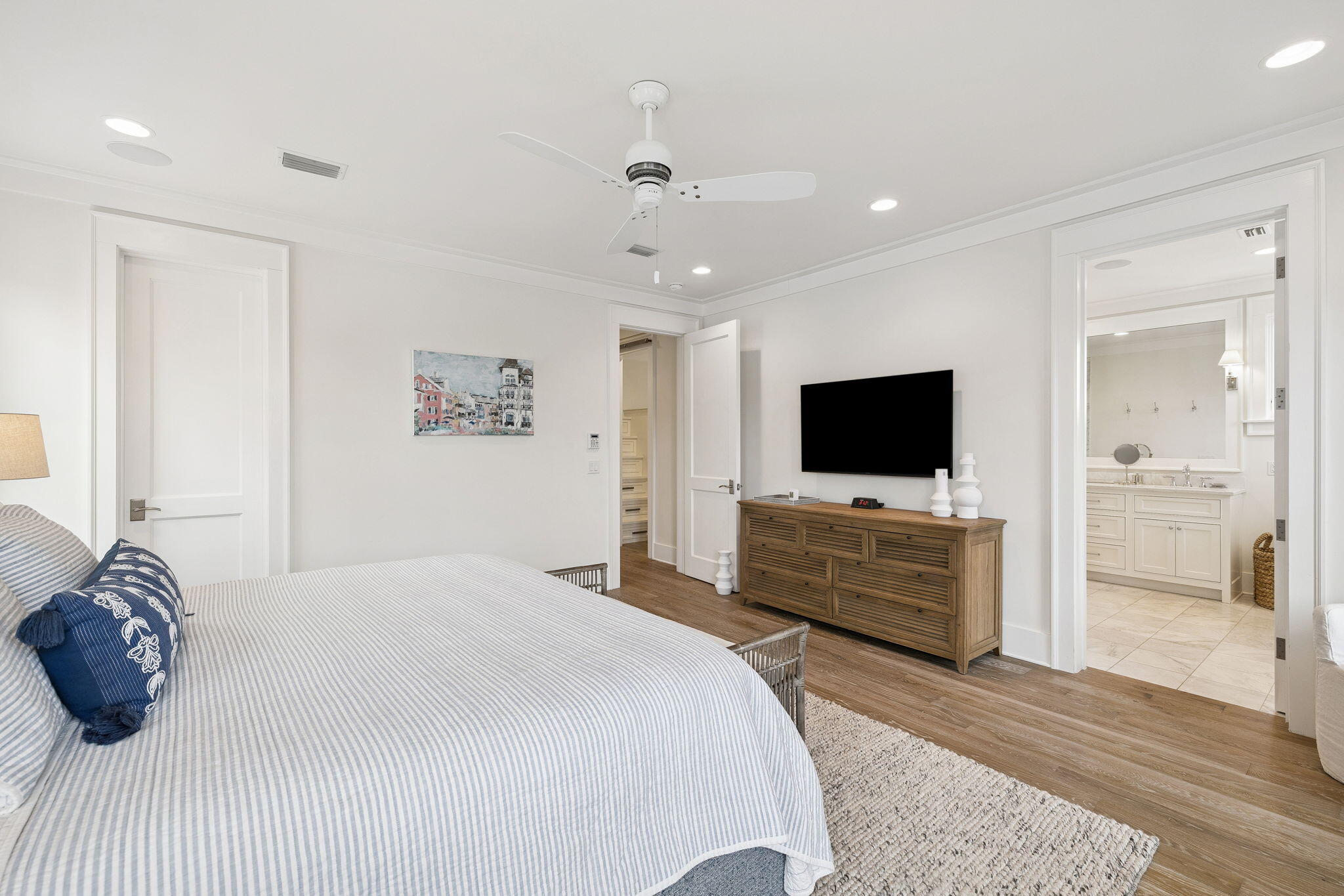 17 Compass Point Way Watersound, FL 32461 - Photo 46 of 73 a bedroom with a bed and a flat screen tv