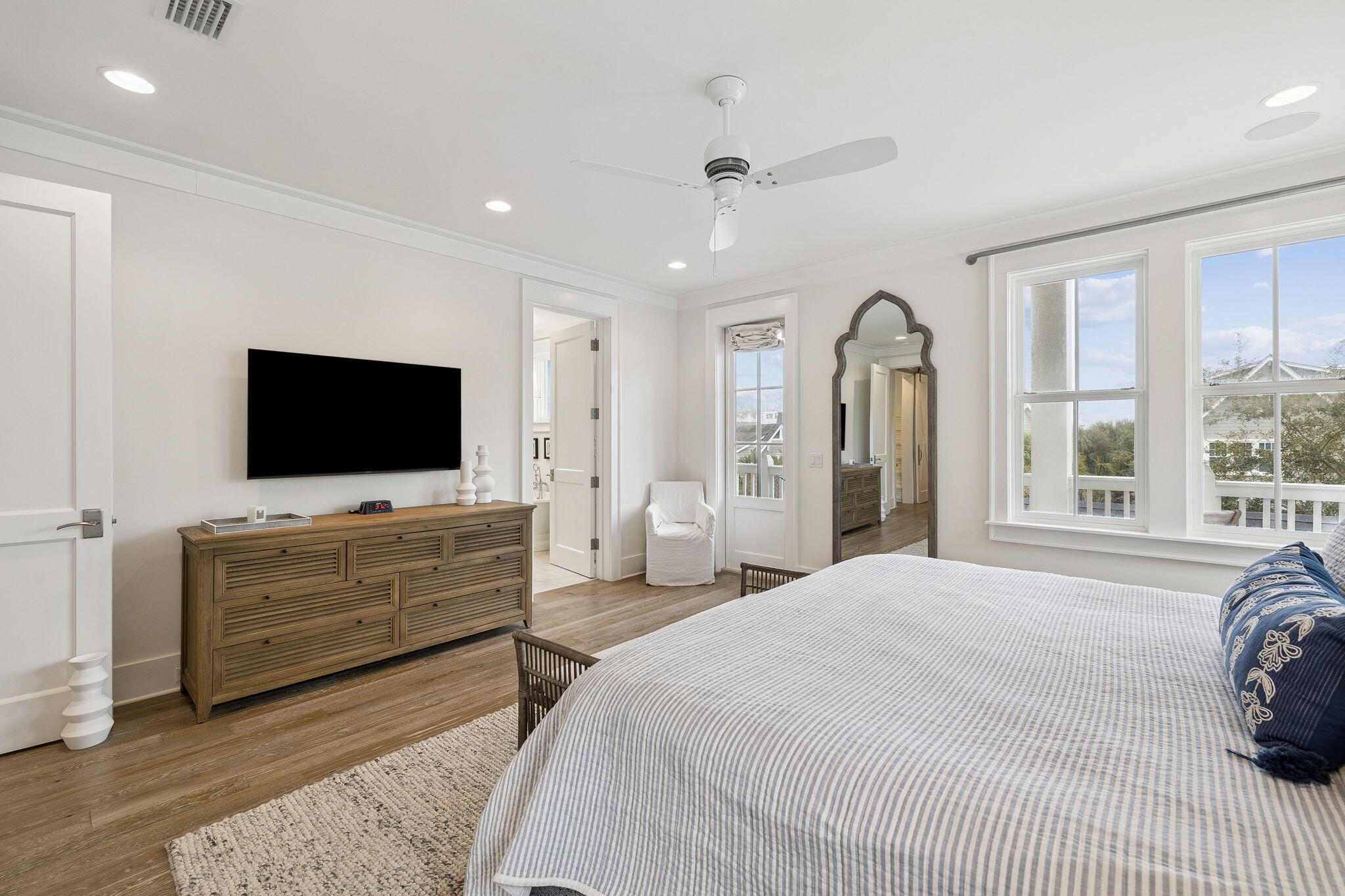 17 Compass Point Way Watersound, FL 32461 - Photo 47 of 73 a bedroom with a bed and a flat screen tv