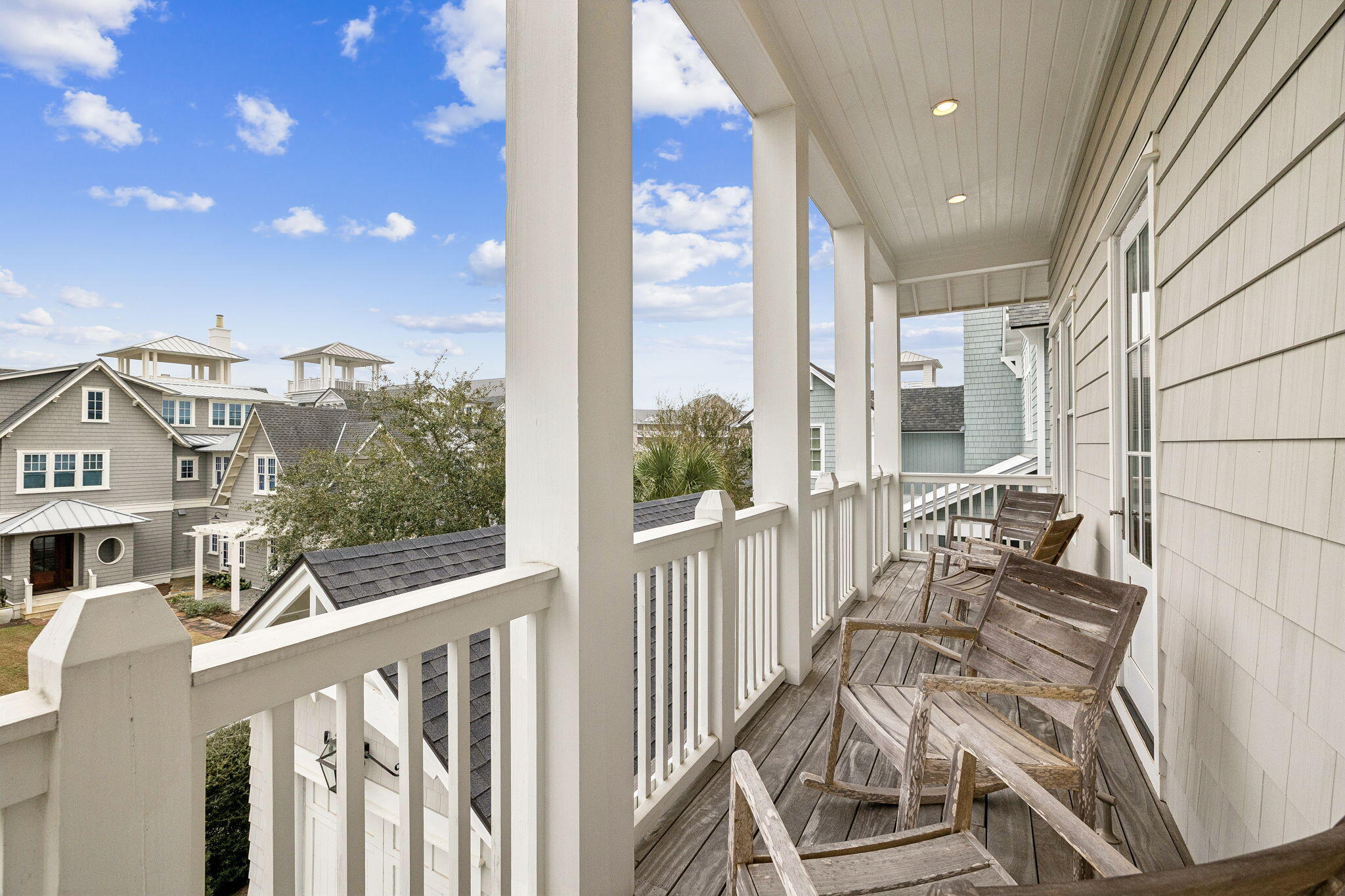 17 Compass Point Way Watersound, FL 32461 - Photo 51 of 73 a view of a balcony with wooden floor and fence