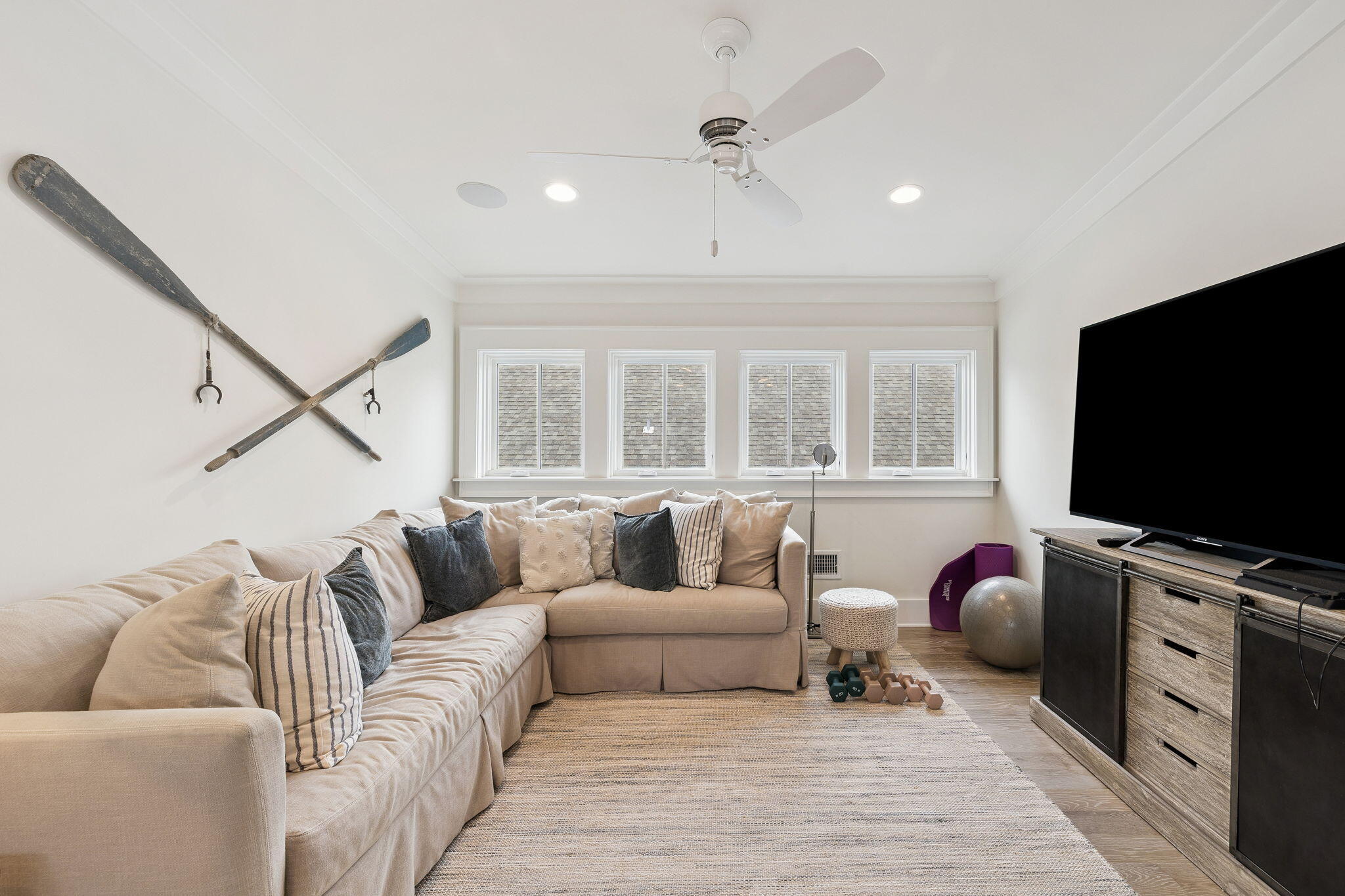 17 Compass Point Way Watersound, FL 32461 - Photo 54 of 73 a living room with furniture and a flat screen tv