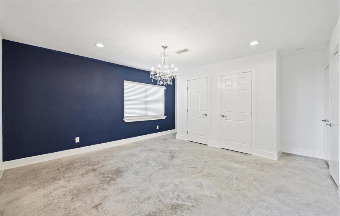 3818 Childress Street Houston, TX 77005 - Photo 5 of 10 a view of an empty room with a window