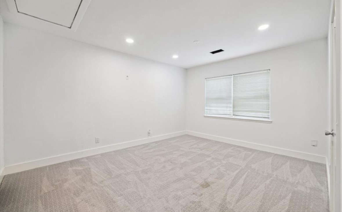3818 Childress Street Houston, TX 77005 - Photo 9 of 10 an empty room with windows