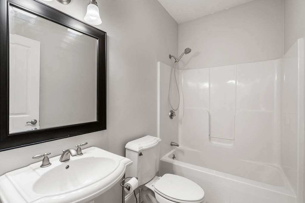 40 Sandy Ridge Road Sterling, MA 01564 - Photo 18 of 33 a bathroom with a sink toilet and shower