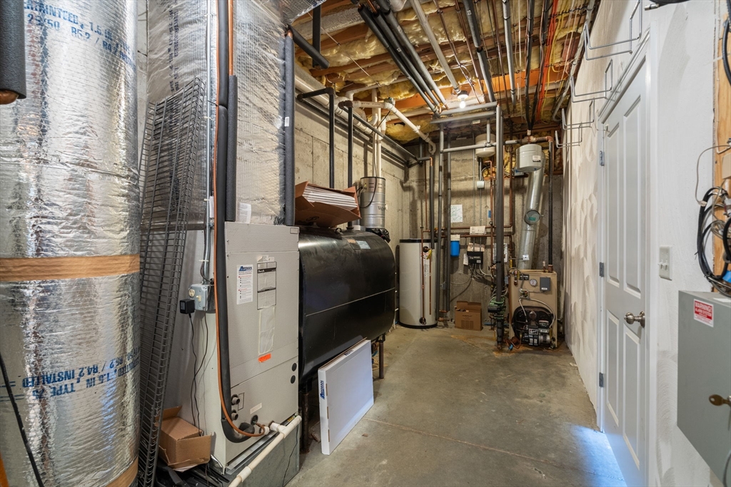 40 Sandy Ridge Road Sterling, MA 01564 - Photo 25 of 33 a view of a storage room with utility room