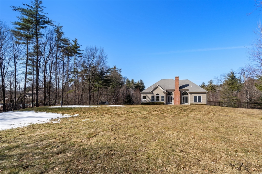 40 Sandy Ridge Road Sterling, MA 01564 - Photo 29 of 33 a front view of a house with a yard