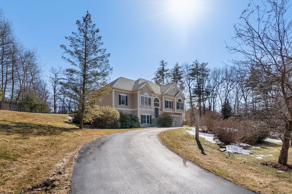 40 Sandy Ridge Road Sterling, MA 01564 - Photo 32 of 33 a view of a town with large trees