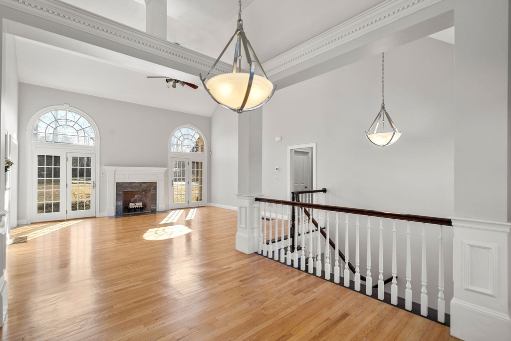 40 Sandy Ridge Road Sterling, MA 01564 - Photo 5 of 33 a view of a livingroom with a fireplace wooden floor and a window