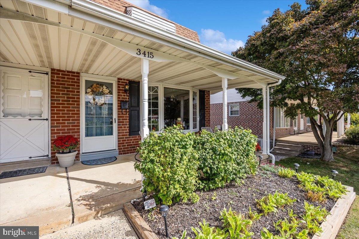 3415 Holyoke Road Philadelphia, PA 19114 - Photo 1 of 37 Charming entrance with lush greenery.