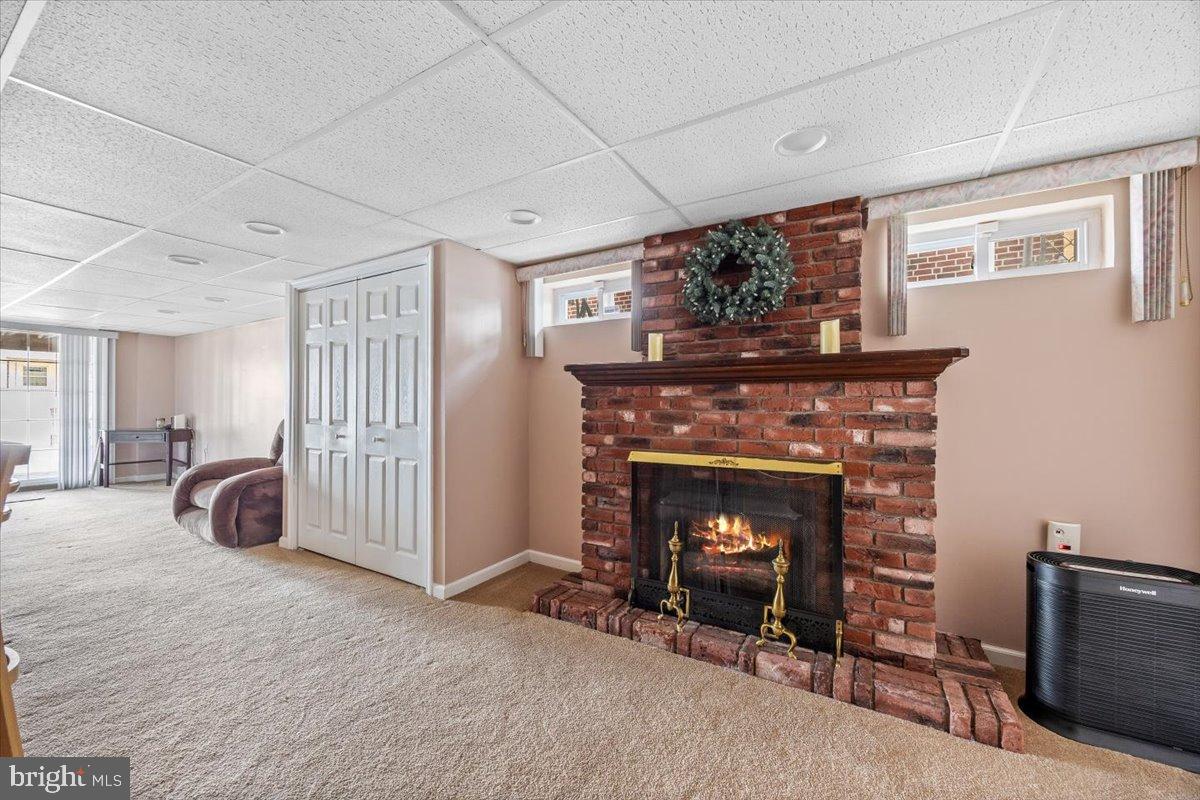 3415 Holyoke Road Philadelphia, PA 19114 - Photo 27 of 37 Cozy basement retreat with a gas fireplace.