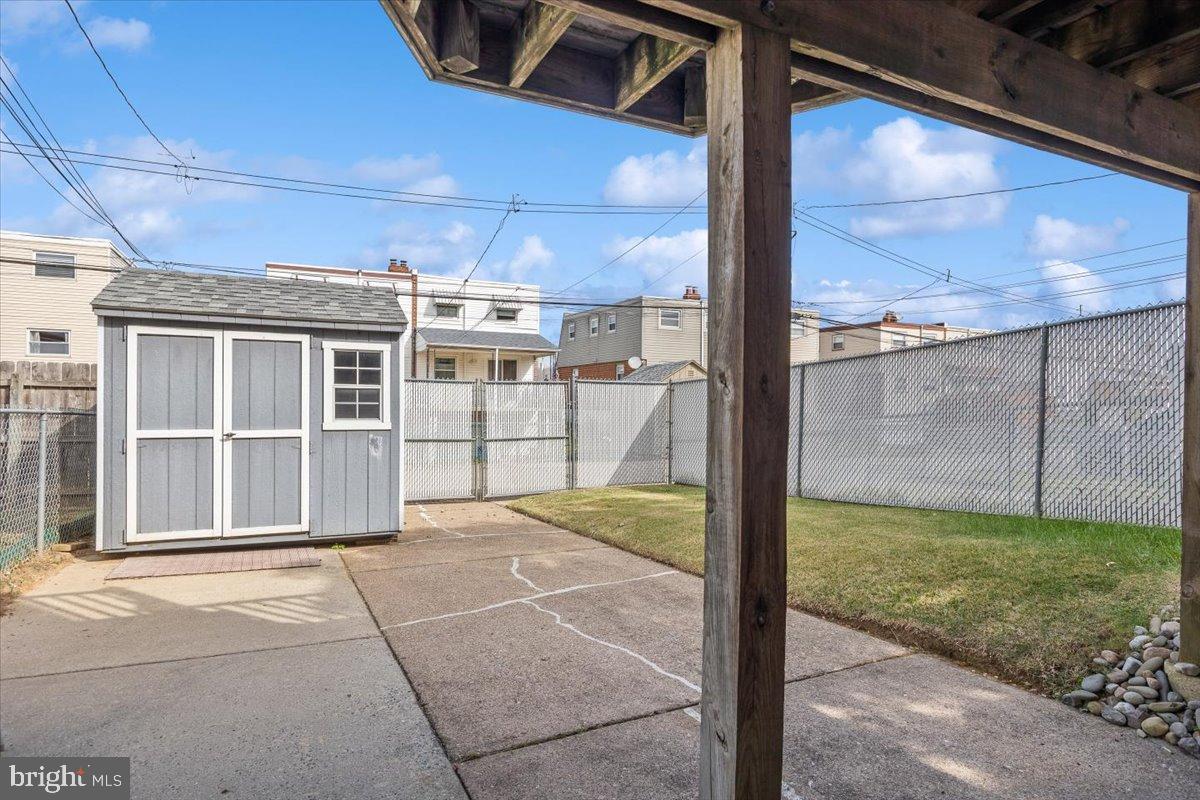 3415 Holyoke Road Philadelphia, PA 19114 - Photo 34 of 37 Spacious outdoor yard with shed and greenery.