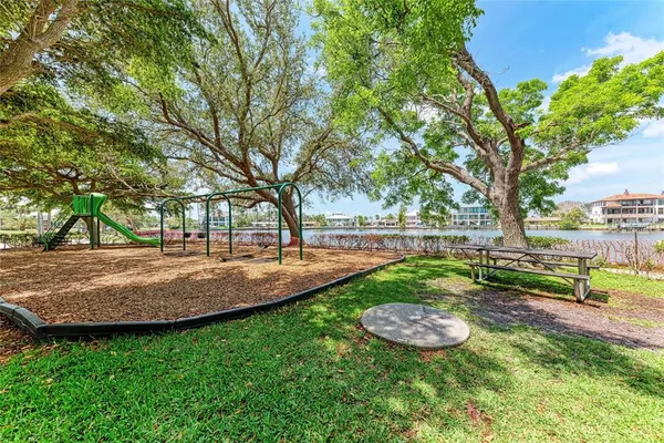 a view of a building with sitting area