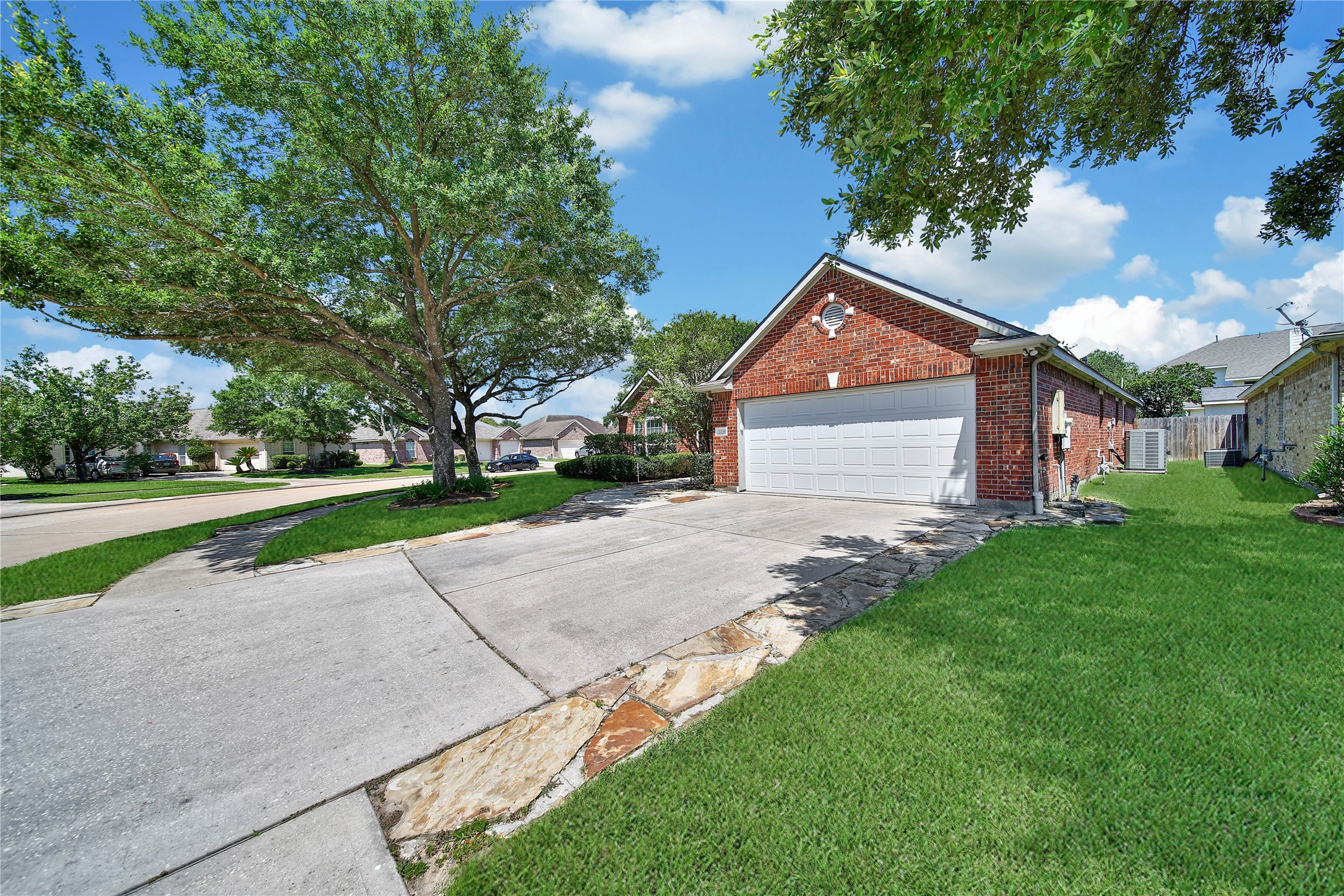21338 Timber Pines Drive Spring, TX 77388 - Photo 4 of 29 a front view of house with yard and green space