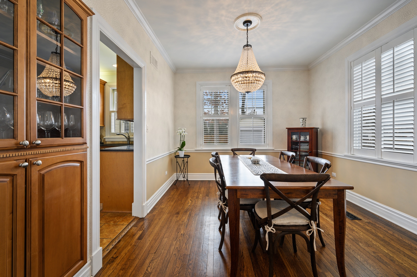 1054 Tower Road Winnetka, IL 60093 - Photo 11 of 32 a view of a dining room with furniture window and wooden floor
