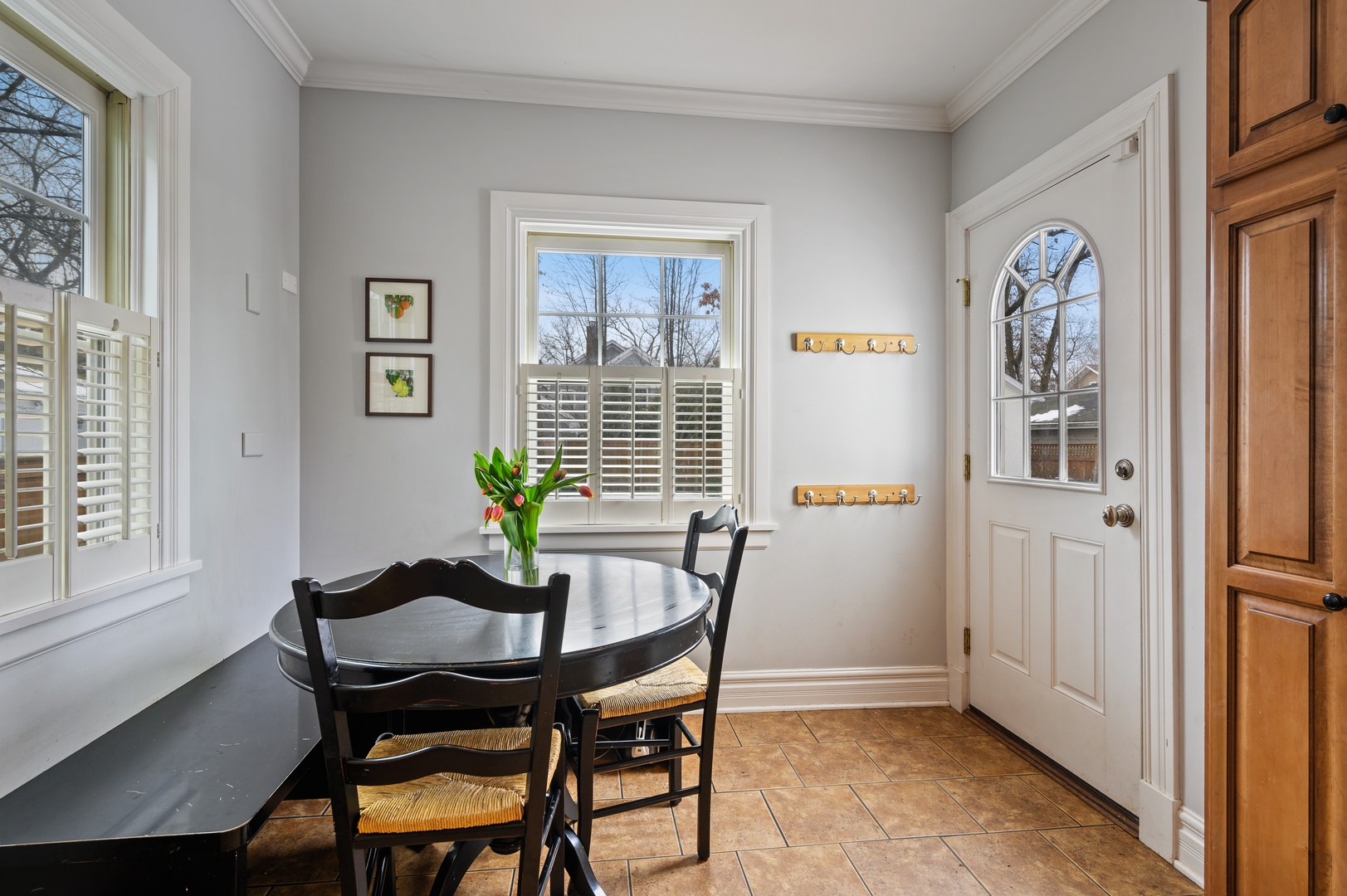 1054 Tower Road Winnetka, IL 60093 - Photo 15 of 32 a dining room with furniture and window