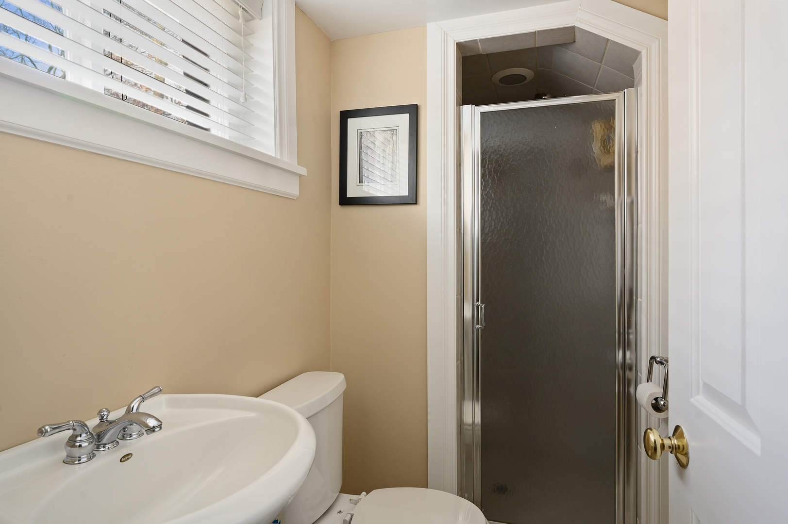 1054 Tower Road Winnetka, IL 60093 - Photo 28 of 32 a bathroom with a sink mirror and toilet
