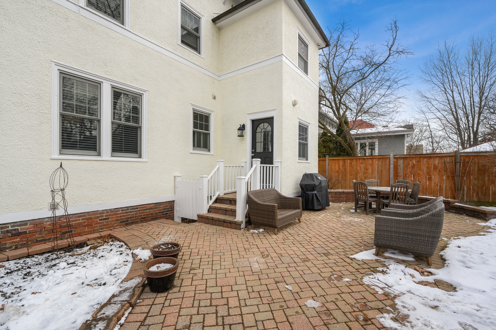 1054 Tower Road Winnetka, IL 60093 - Photo 30 of 32 a view of a patio with chair and tables