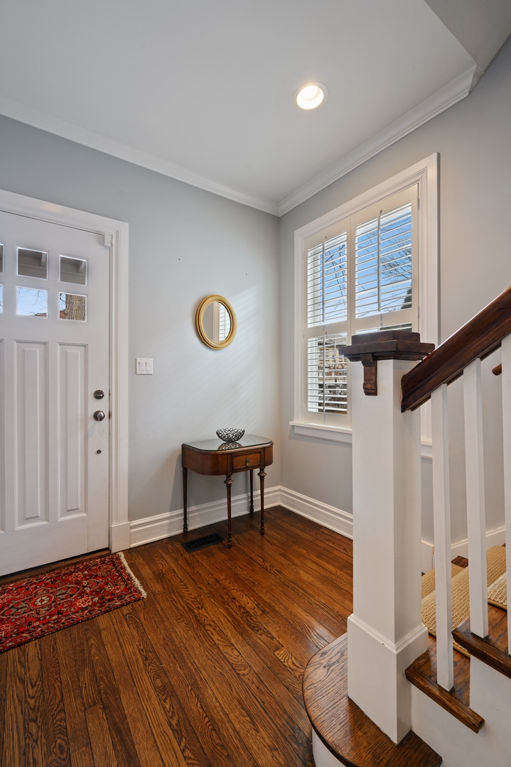 1054 Tower Road Winnetka, IL 60093 - Photo 4 of 32 a view of a livingroom with furniture and window