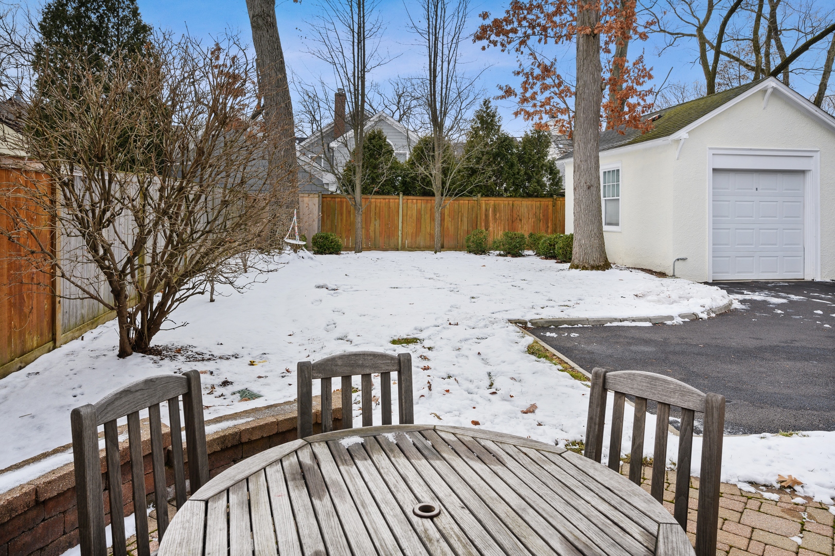 1054 Tower Road Winnetka, IL 60093 - Photo 31 of 32 a view of a roof deck with wooden floor and fence