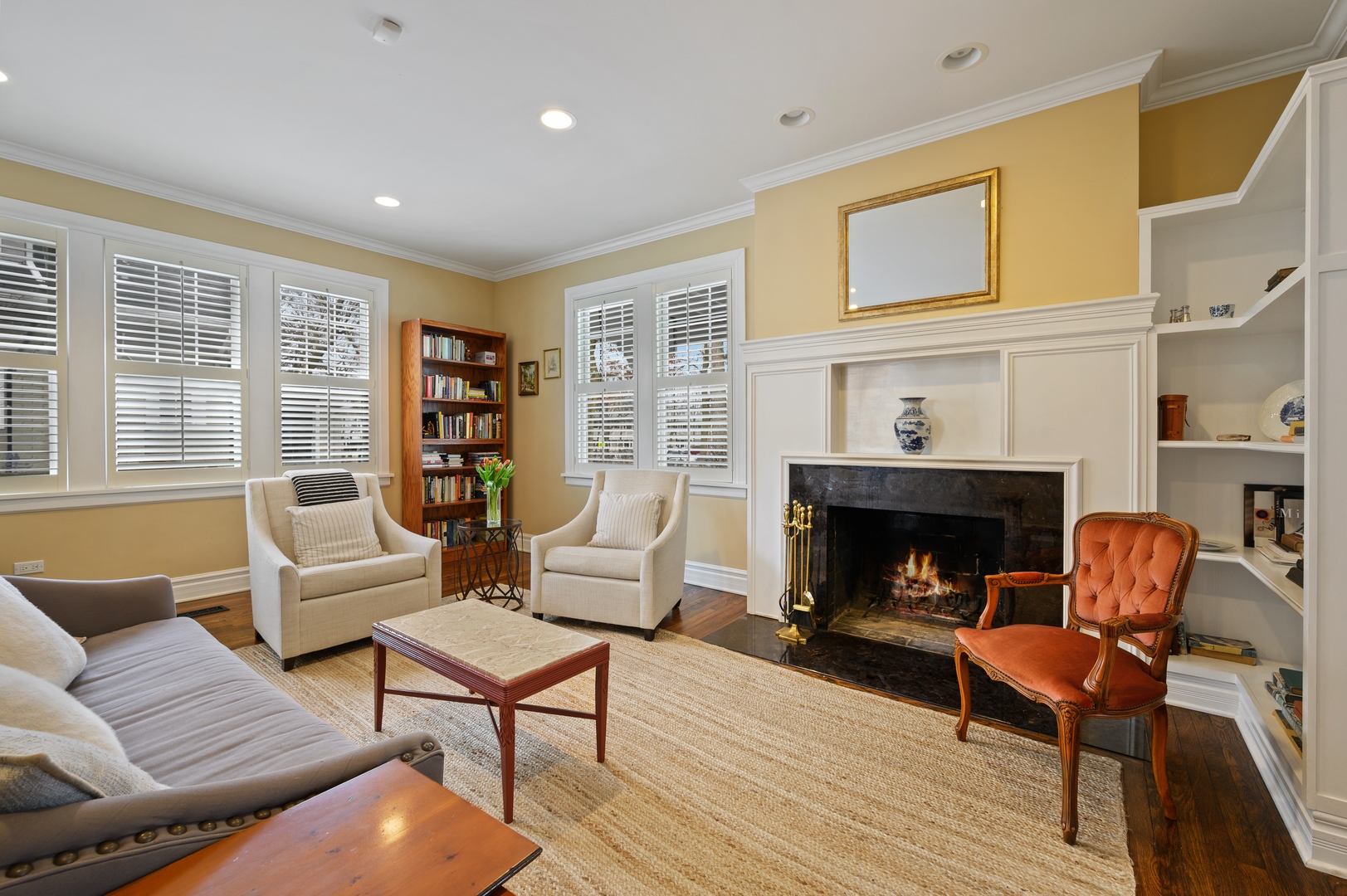 1054 Tower Road Winnetka, IL 60093 - Photo 6 of 32 a living room with furniture and a fireplace