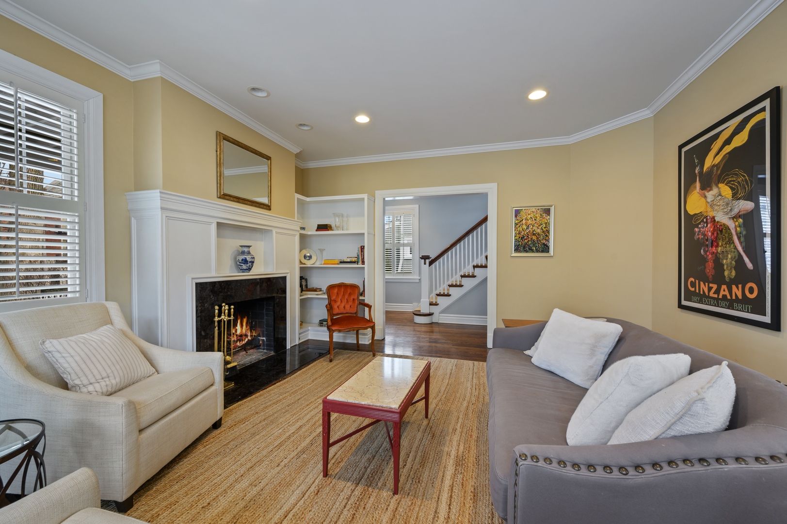 1054 Tower Road Winnetka, IL 60093 - Photo 9 of 32 a living room with furniture and a fireplace