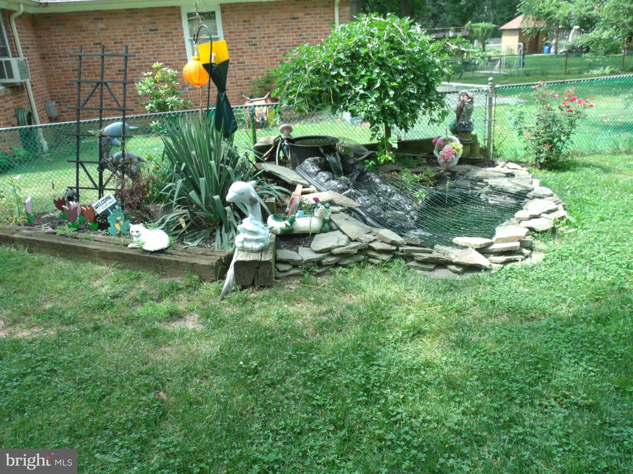 326 Upperlanding Road Baltimore, MD 21221 - Photo 25 of 25 Pond in back yard.