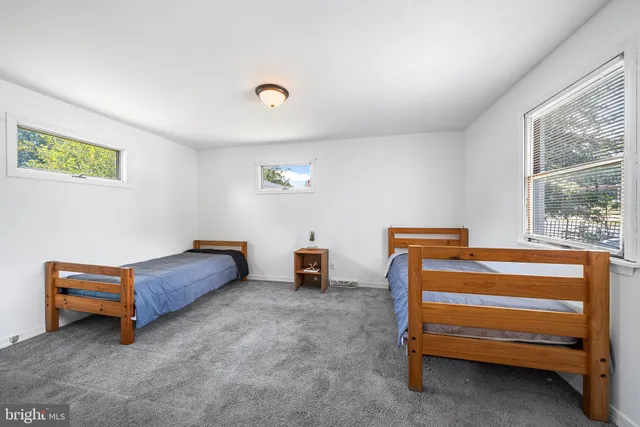 a room with stairs and a window