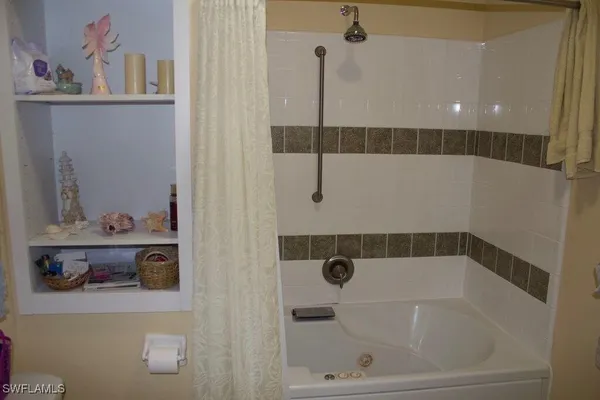 a kitchen with stainless steel appliances a refrigerator and sink