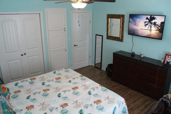 a bedroom with a bed and furniture
