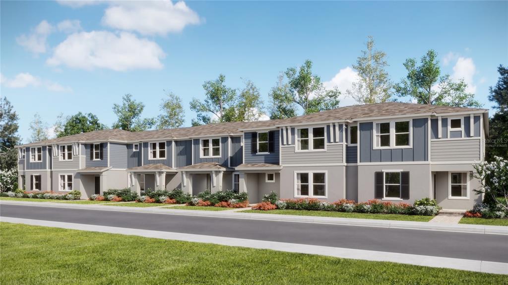 5200 Clay Whaley Road St. Cloud, FL 34772 - Photo 1 of 27 a front view of a residential apartment building with a yard