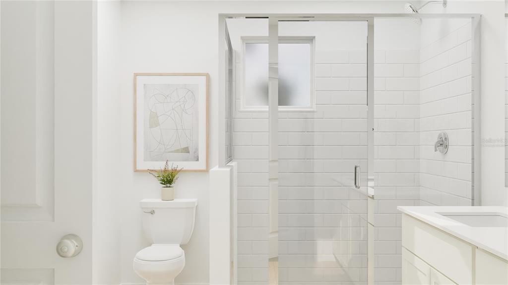 5200 Clay Whaley Road St. Cloud, FL 34772 - Photo 22 of 27 a bathroom with a sink a toilet and shower