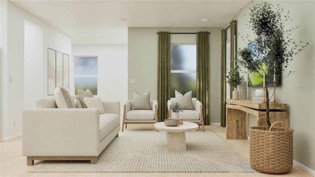 5200 Clay Whaley Road St. Cloud, FL 34772 - Photo 7 of 27 a living room with furniture and a potted plant