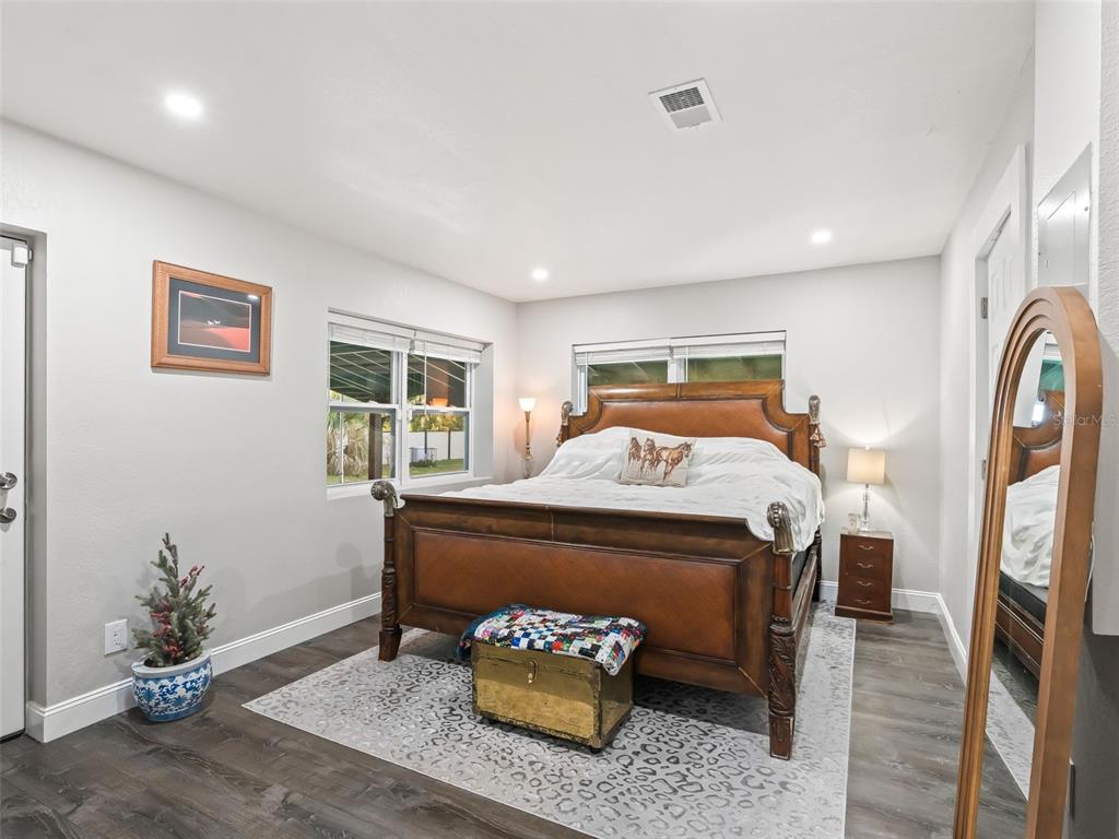 3505 Northeast 97th Street Road Anthony, FL 32617 - Photo 15 of 36 a bed room with a bed and a couch