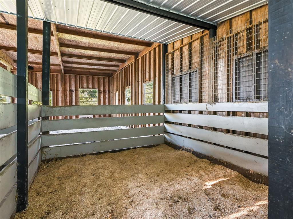 3505 Northeast 97th Street Road Anthony, FL 32617 - Photo 31 of 36 a bathroom with a tub and a large window