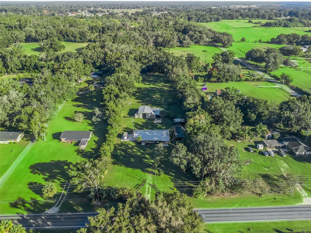 3505 Northeast 97th Street Road Anthony, FL 32617 - Photo 37 of 38 a view of a garden with a field