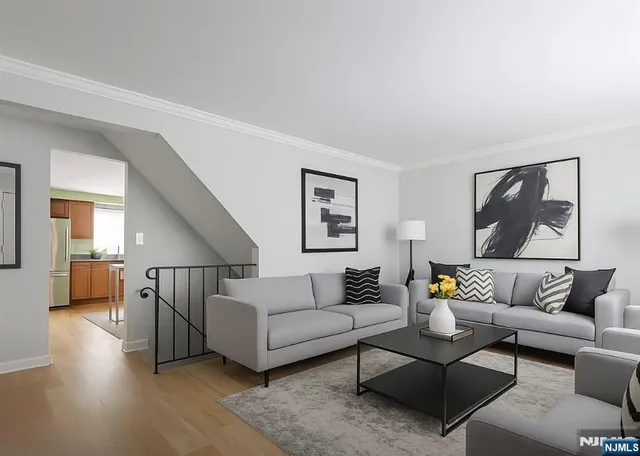 a living room with furniture and a couch