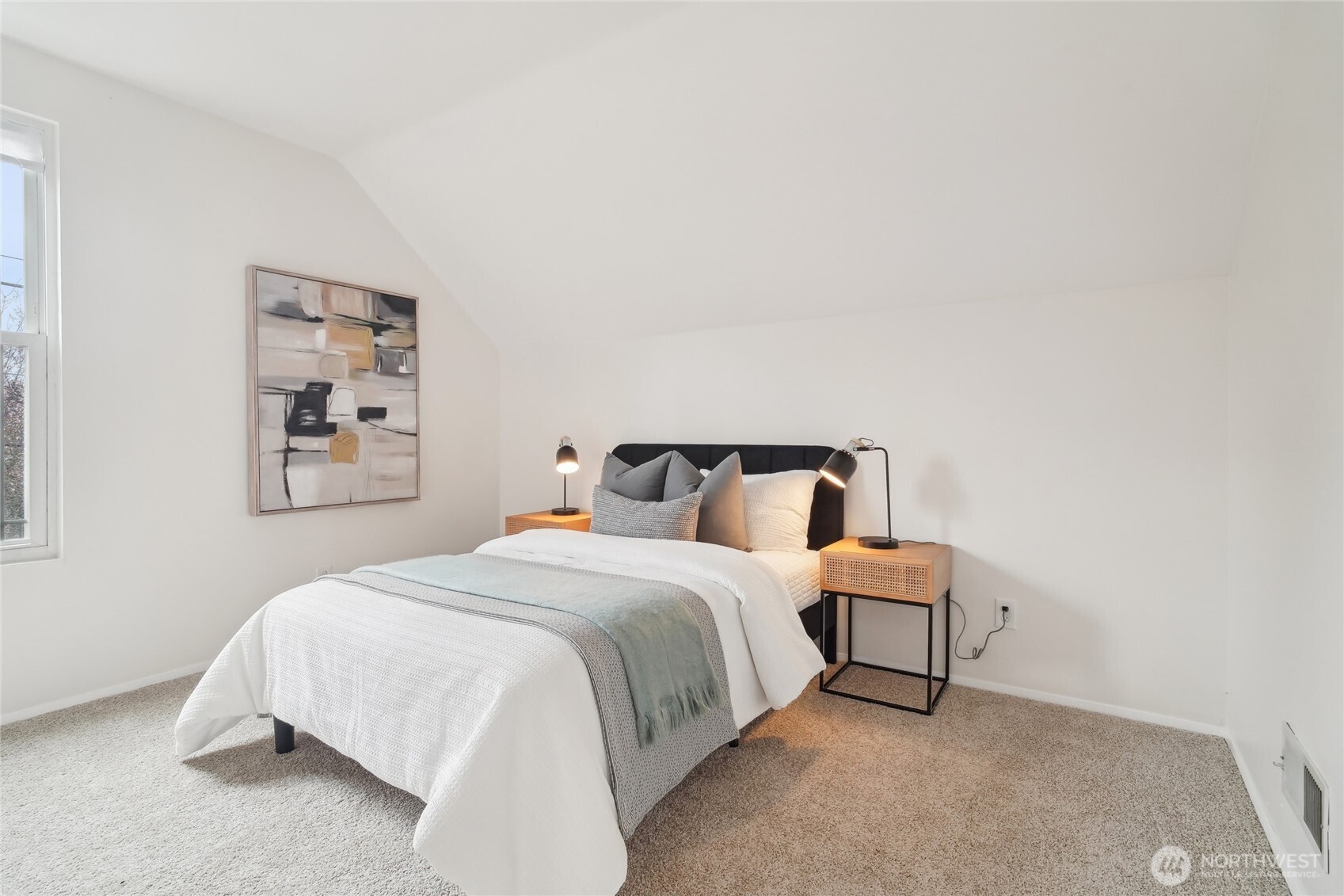 1420 North 50th Street Seattle, WA 98103 - Photo 21 of 32 a bedroom with bed and night stand