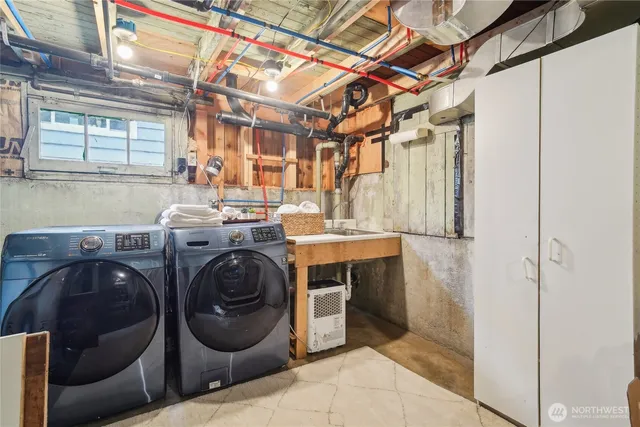 a utility room with dryer and washer