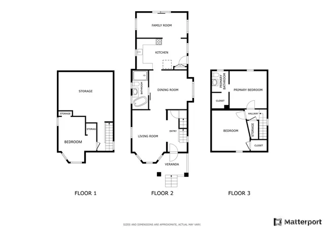 an aerial view of residential houses with outdoor space and parking