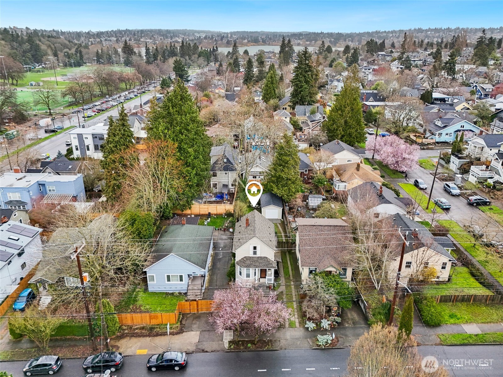 1420 North 50th Street Seattle, WA 98103 - Photo 30 of 32 an aerial view of residential houses with outdoor space and parking